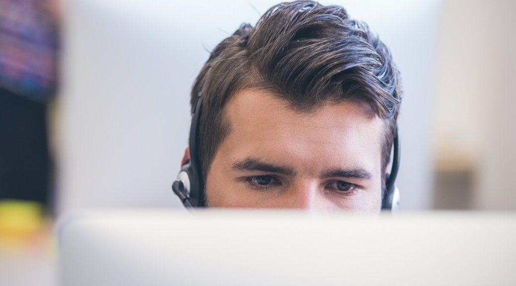 Looking for a telecoms job on a computer - Hays Viewpoint, careers advice blog