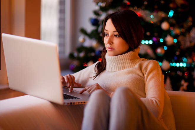 Woman searching for a job over the Christmas break-Hays Viewpoint, careers advice blog